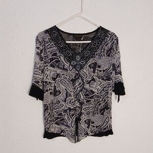 Elegant Black and White Paisley Blouse